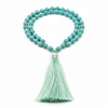 Luxury aqua blue turquoise mala necklace with mint tassel front view
